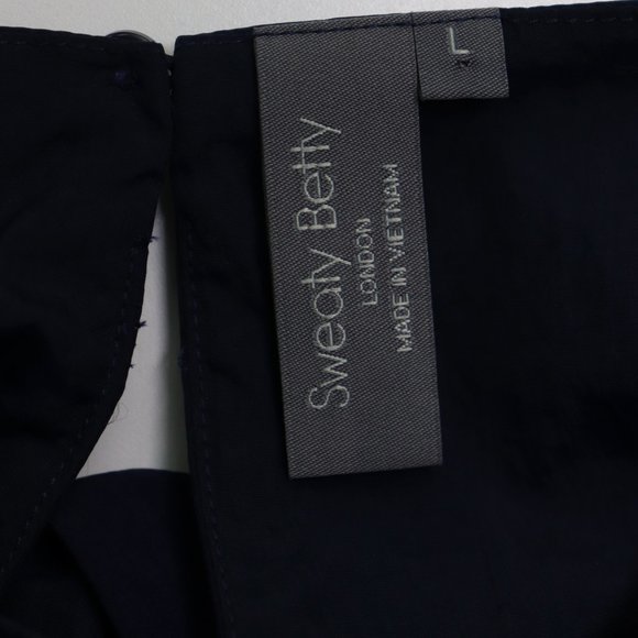 NEW Sweaty Betty Air Flow Wide Leg Jumpsuit High Neck Activewear Navy Blue Large - Picture 4 of 7